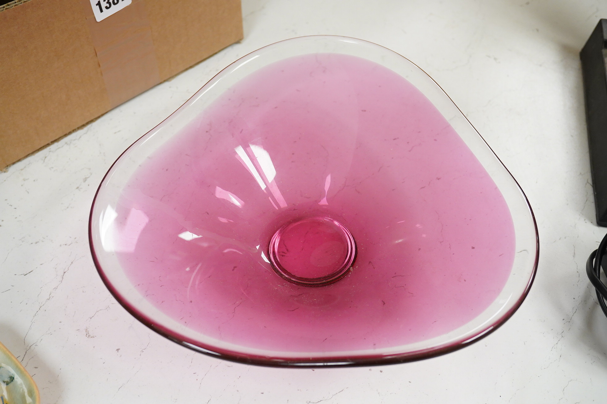 Michael Magyar, a cranberry glass dish, signed to the base, 26cm wide